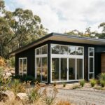 BAL-40 rated uPVC window installed in a modern NSW home with bushfire-resistant glazing, ember-proof seals and reinforced frame overlooking a dry Australian landscape